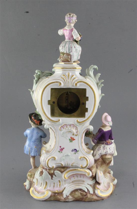 A Meissen porcelain mantel clock case, 19th century height 38cm, typical tiny losses